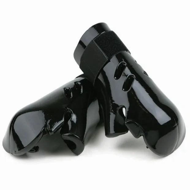 A pair of black foam sparring hand gear